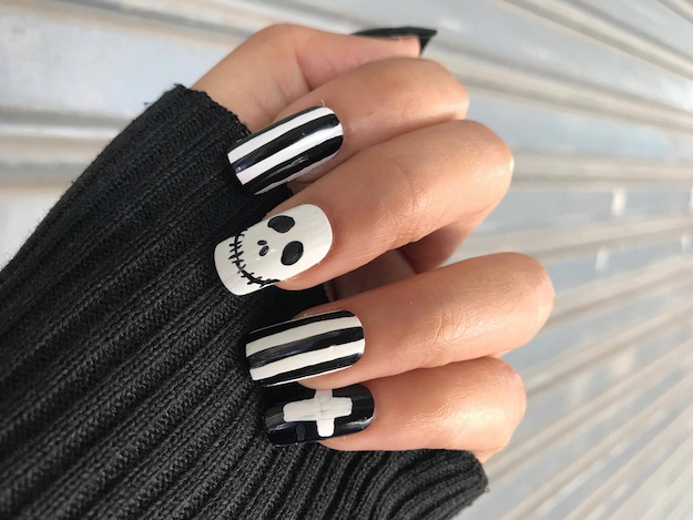 Check out Glow In The Dark Halloween Nail Art Tutorial at https://naildesigns.com/glow-in-the-dark-halloween-nail-art/