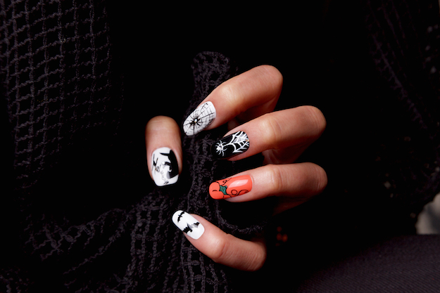 Check out Glow In The Dark Halloween Nail Art Tutorial at https://naildesigns.com/glow-in-the-dark-halloween-nail-art/