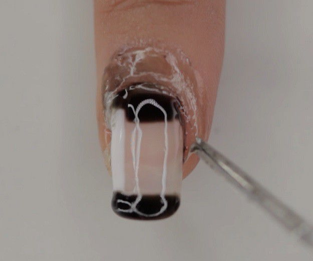 Step 4: Apply top coat, remove peel−off | Super Easy Geometrical Negative Space Nails You Can Wear on Your Date