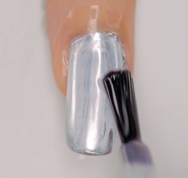 Paint metallic polish onto the nail | Metallic Nail Art Design | Have You Heard Of Chrome Nails?
