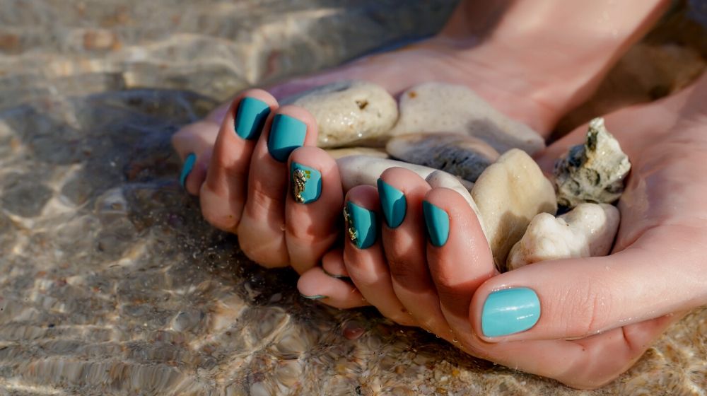 female hand turquoise nail design sea | Beautiful Nail Polish Shades for Spring