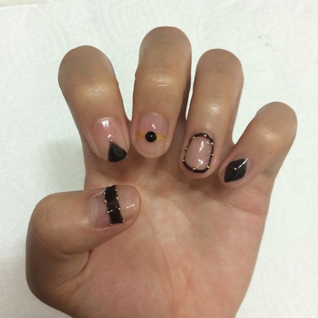 Check out Easy Pink and Black Nails Tutorial Using Sponge Technique at https://naildesigns.com/pink-and-black-nails-tutorial/