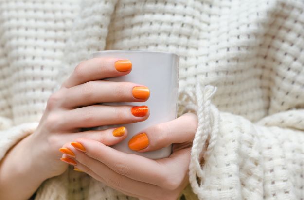 Check out DIY | Sunset Orange Ombre Nail Art Perfect For Summer at https://naildesigns.com/diy-orange-ombre-nail-art/