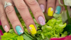 woman showing off her bunny rabbit nail art design | Fun Easter Nails and Designs You Should Check Out | easter nail designs | nail‌ ‌designs‌ ‌for‌ ‌easter‌ ‌| Featured