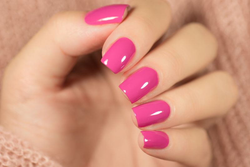 black white and hot pink nail design