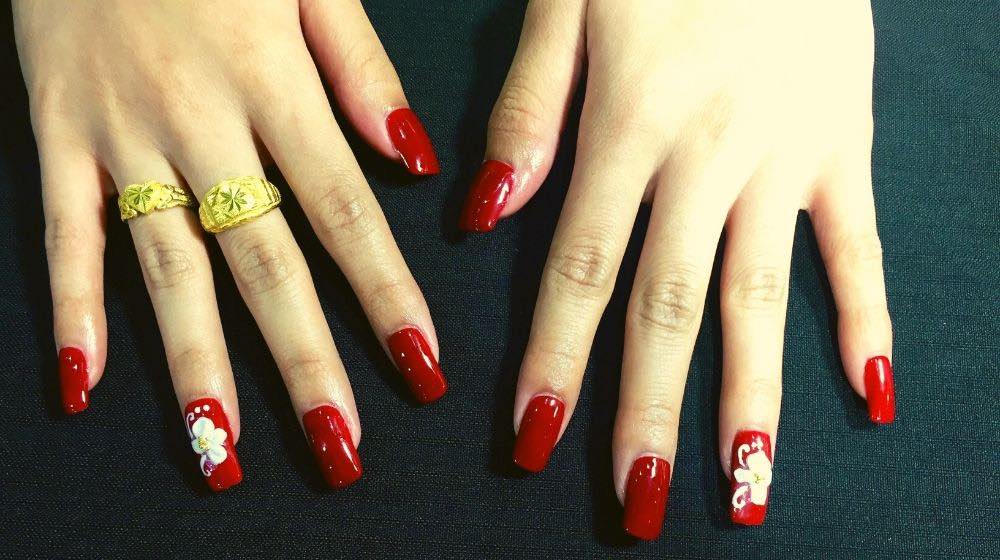 red long nails with flower art | Sexy Red Nail Designs You Should Wear This Christmas