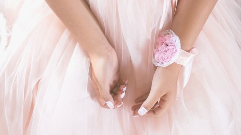 girl with a wrist corsage | Sophisticated Nail Art Designs For Every Working Mom
