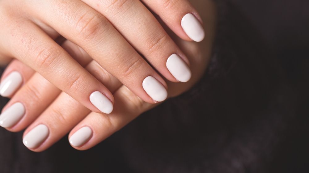 beautiful woman nails bright manicure | Gorgeous White Nail Designs For Every Occasion