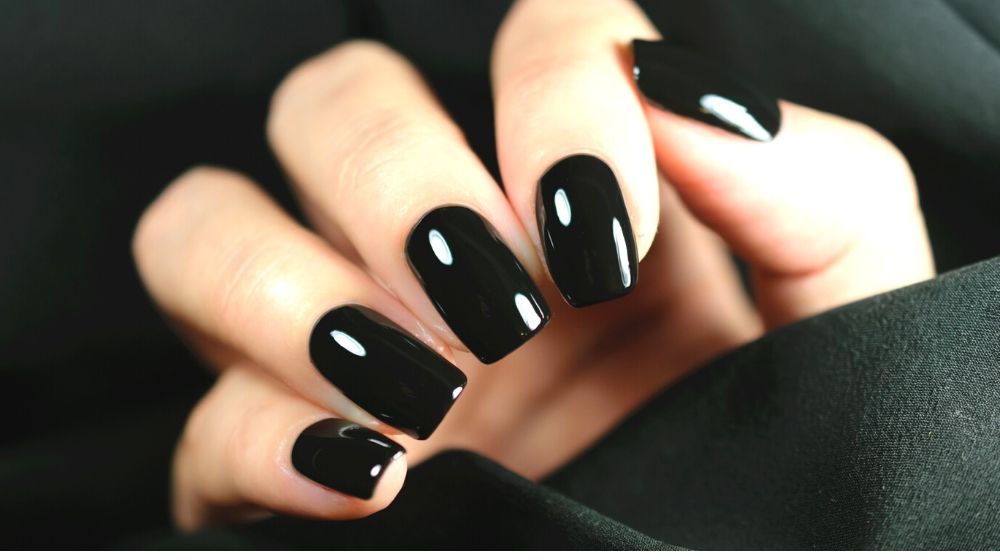 manicure on female hands | Dainty Black Nail Designs You Should Try