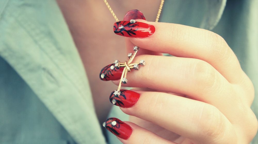 Red nails with blings | Sexy Red Nail Designs You Should Wear This Christmas