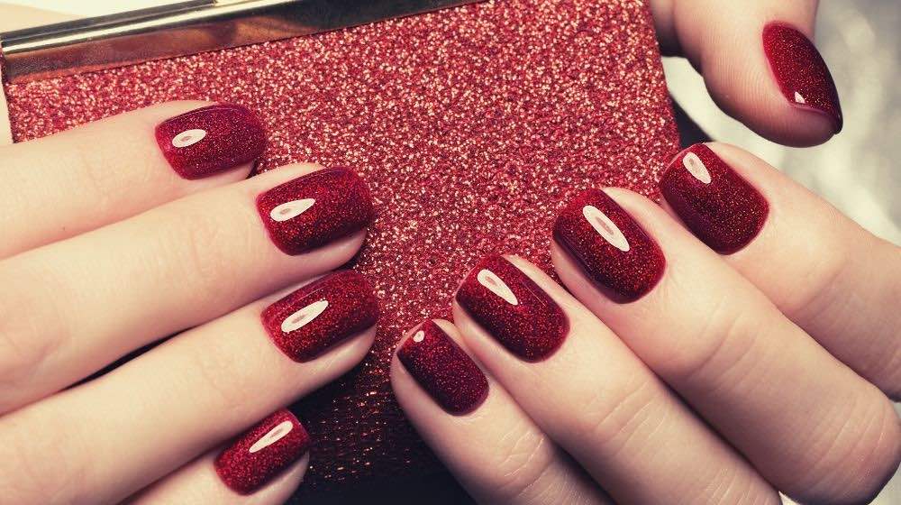 Red glittered nails | Sexy Red Nail Designs You Should Wear This Christmas