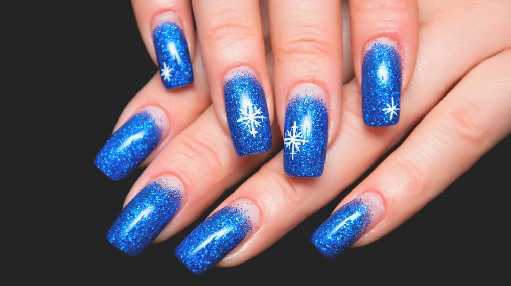 christmas shiny blue manicure snowflakes | Latest Nail Art Designs You Should Try