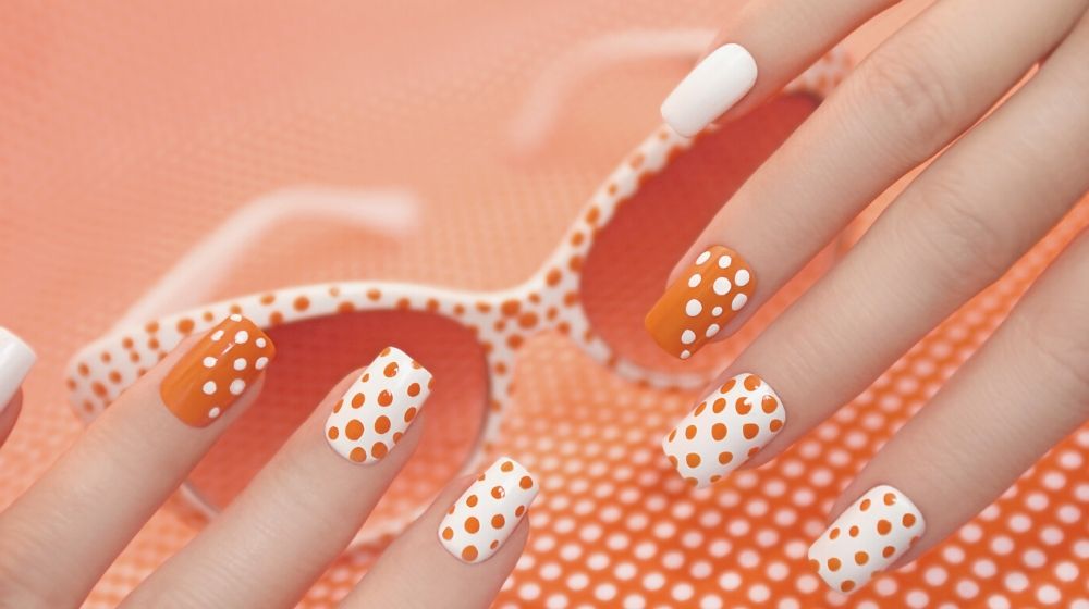 sunny orange manicure dots on womens | Latest Nail Art Designs You Should Try