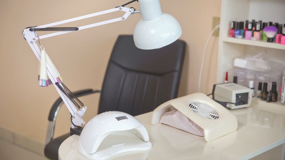 manicure studio white lamp on table | UV Nail Lamp vs LED Nail Dryer | Which One Should You Get?