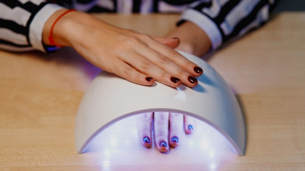 pretty girl dry your nails | UV Nail Lamp vs LED Nail Dryer | Which One Should You Get?