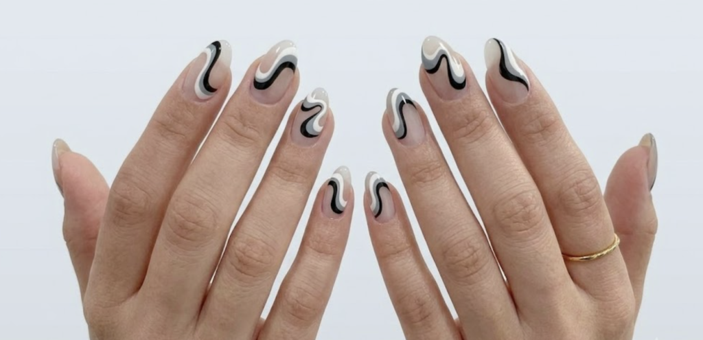 Create Monochrome Nail Art with Negative Space and Clean Edges