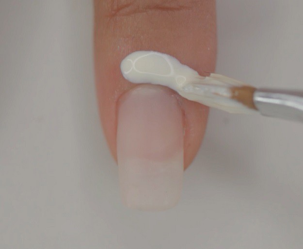 Step 1: Put peel−off base coat | Super Easy Geometrical Negative Space Nails You Can Wear on Your Date Step 1: Put peel−off base coat | Super Easy Geometrical Negative Space Nails You Can Wear on Your Date