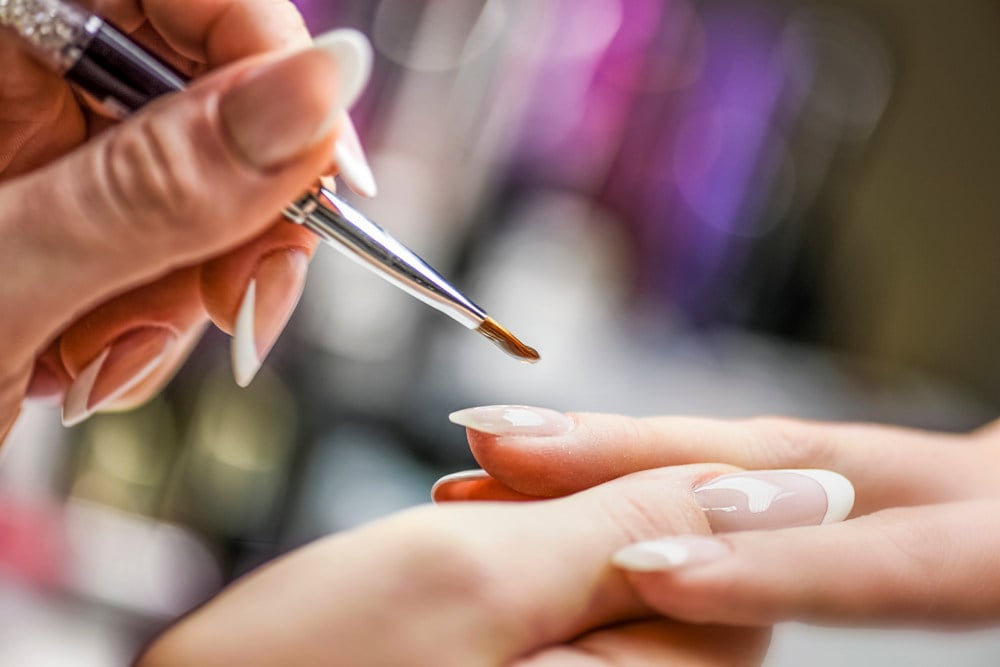 Manicure nail paint with thin brush on colour background | Glitter Nail Polish Hack | This Will Change Your Nail Game In An Instant 