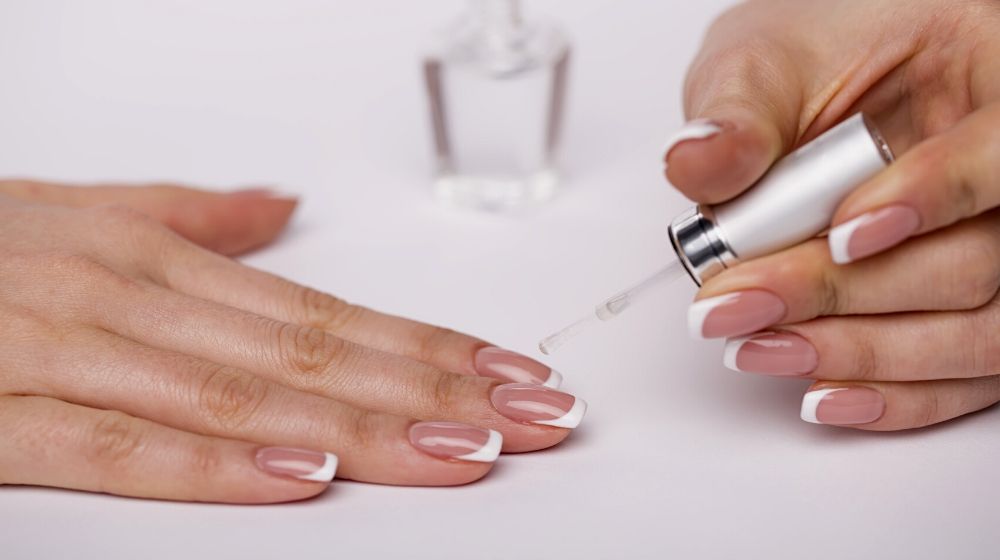 manicured female hands on light background | Gorgeous White Nail Designs For Every Occasion